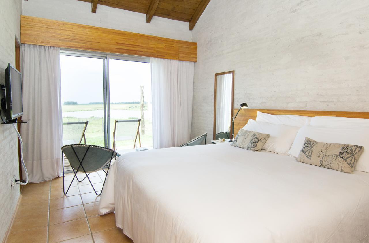 Posada Mosaico Villas Garzon Habitación foto
