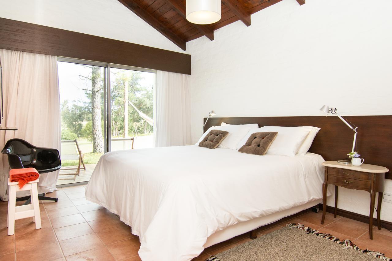 Posada Mosaico Villas Garzon Habitación foto